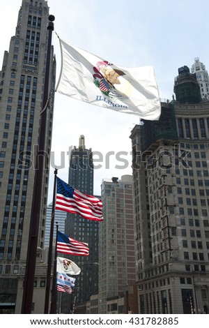 Flags Infront of Skyscraper