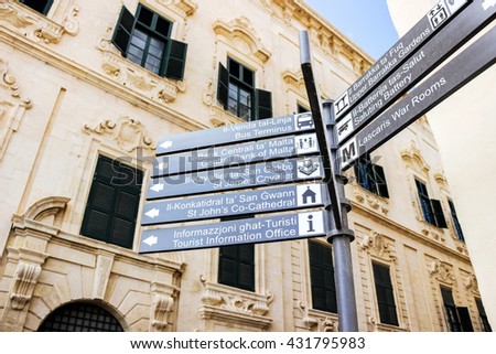 cityscape with road guide sign in Valletta Malta