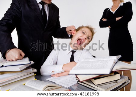 Parents forcing sin to do homework Royalty-Free Stock Photo #43181998