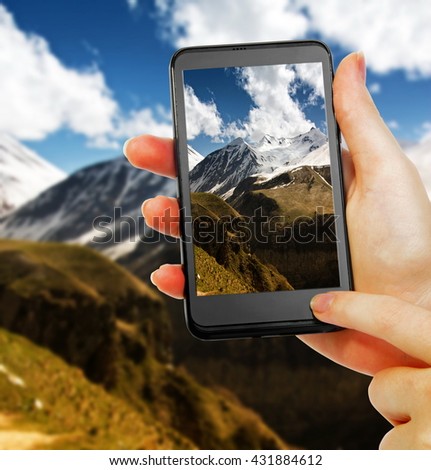 taking photo of the mountain landscape