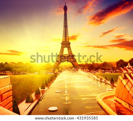 Paris. Eiffel Tower and fountain at Jardins du Trocadero at sunrise, Paris, France. Beautiful Romantic background