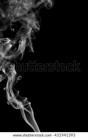 Abstract white on black background from the incense sticks