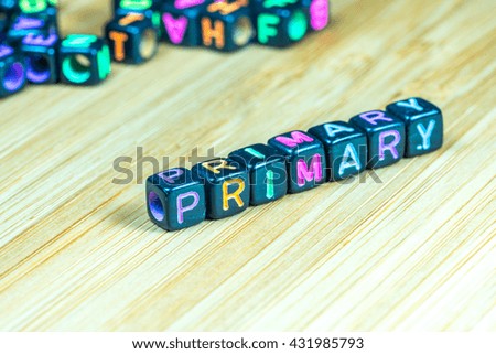 Colorful letter cube with bamboo texture surface. Educational concept