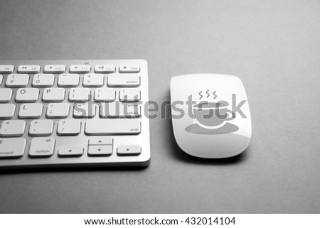 Coffee break & holiday icon on mouse & computer keyboard