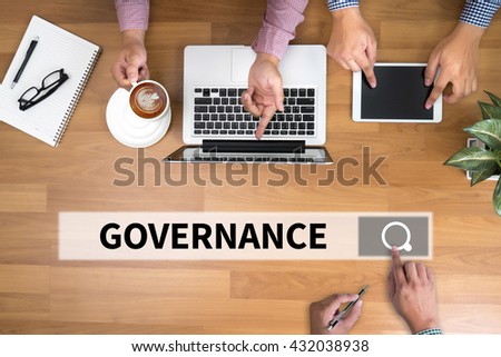 GOVERNANCE man touch bar search and Two Businessman working at office desk and using a digital touch screen tablet and use computer, top view