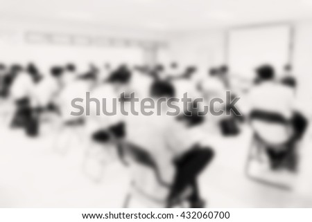Blur background of student during study or test and exams from teacher or professor in classroom in undergraduate at university. Learning studying group in school.