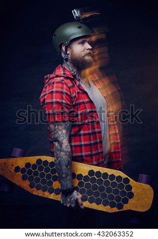 Portrait of skateboarded with go pro on his helmet.