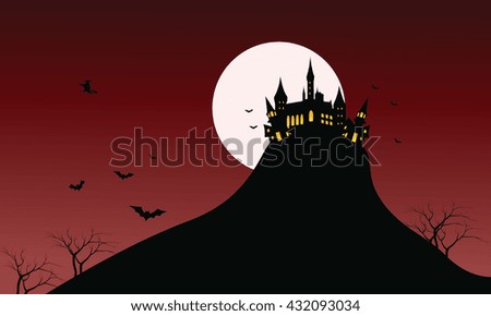 Silhouette of Castle Halloween in hills with red backgrounds