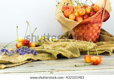fresh berries, sweet cherries in basket on white background, food