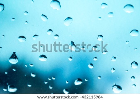 abstract photo of water drop on blue mirror : for background use