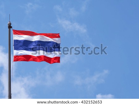 Thailand waving flag flew on top of the pillars.

