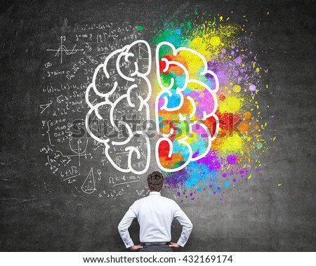 Right and left hemispheres, creative and analytical thinking concept with businessman looking at chalkboard with sketch Royalty-Free Stock Photo #432169174