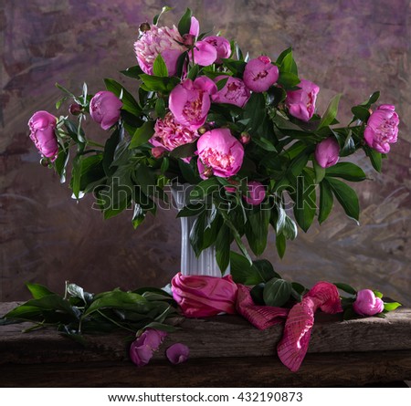 Beautiful bouquet of pink peonies on a soft multicolored background