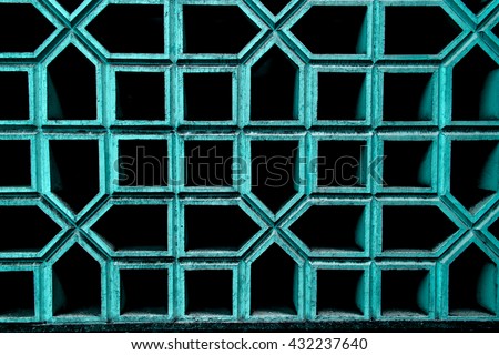 Dark background consisting of black pentagons and squares on white contours. Photography can be used for creating textures, graphics editors, postcards. invitations and unique design