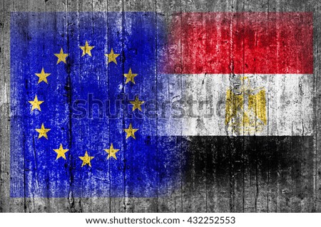 EU and Egypt flag on concrete wall 