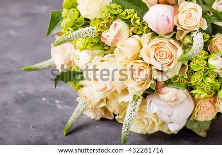 Bouquet of cream roses and pink peonies