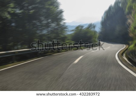Winding asphalt road background