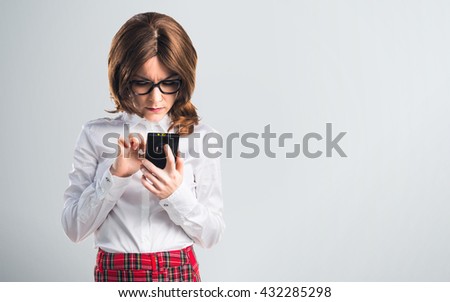 Teen student girl talking to mobile