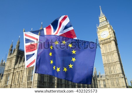 European Union and British Union Jack flag flying in front of Big Ben and the Houses of Parliament at Westminster Palace, London, in preparation for the Brexit EU referendum Royalty-Free Stock Photo #432325573