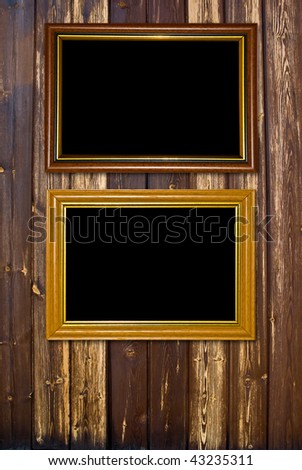 Grunge wood background with vintage gold frame