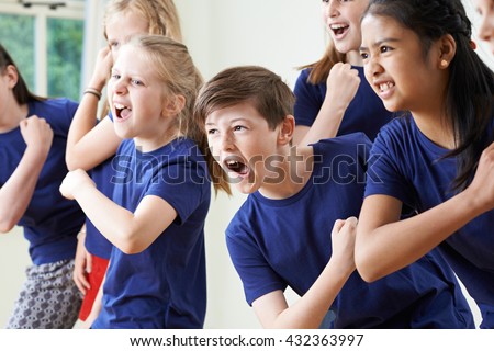 Group Of Children Enjoying Drama Class Together Royalty-Free Stock Photo #432363997