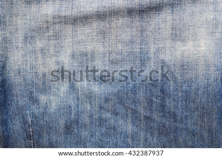 old blue denim jeans texture background