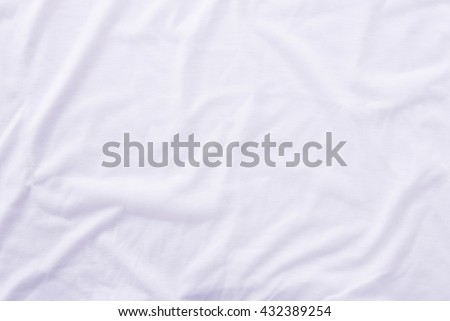 Close up of wrinkled white bedsheet texture background. Royalty-Free Stock Photo #432389254