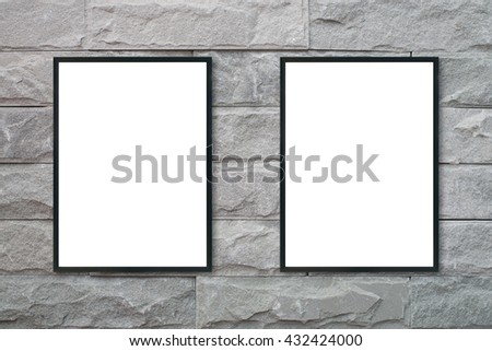 Mock up blank poster picture frame on brick wall.