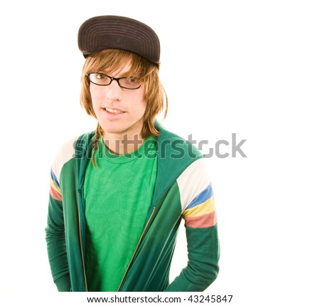 Teenage boy in jacket and ball cap on white background