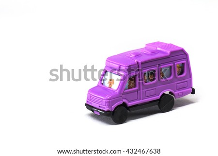 Plastic toy, purple school bus isolated on white background
