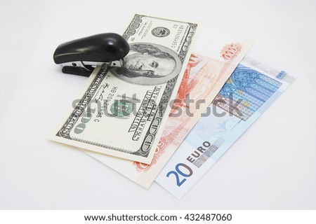 Different money close up on a white background