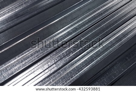 Sheet metal profiles. Shiny striped metal background, texture