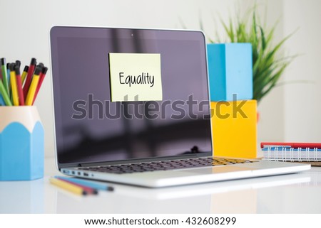 Equality sticky note pasted on the laptop