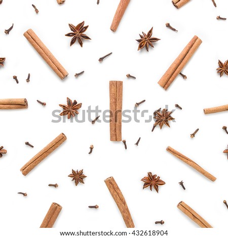 Set of cinnamon, clove and star anise, scattered in a chaotic manner, isolated on white background Royalty-Free Stock Photo #432618904