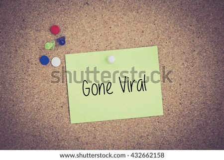 Gone Viral written on sticky note pinned on pinboard