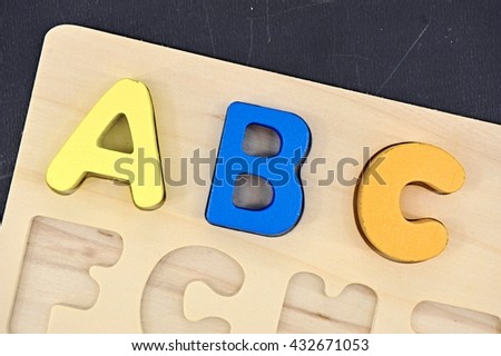 A studio photo of wooden letters