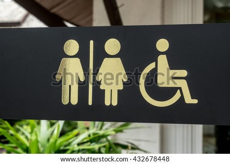 Black Toilet label with gold sign