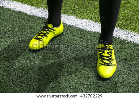 soccer player with soccer boots.