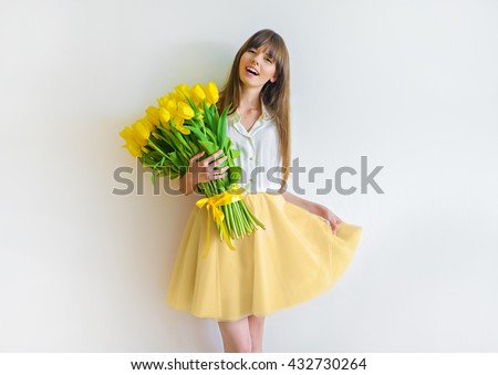image of cute woman with bouquet