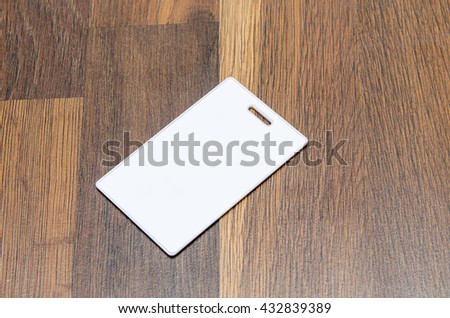 magnetic badge on a wooden surface For graphic designers presentations and portfolios