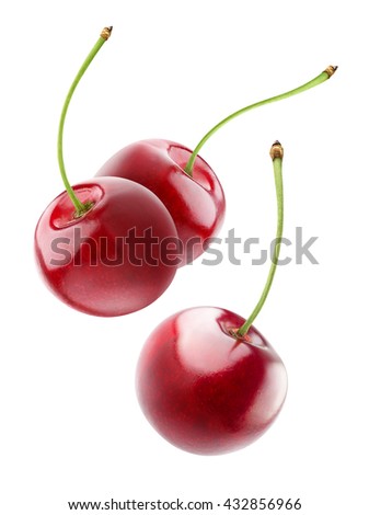 Isolated cherries. Three flying cherry fruits isolated on white background with clipping path Royalty-Free Stock Photo #432856966