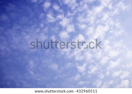 Small clouds in blue sky.