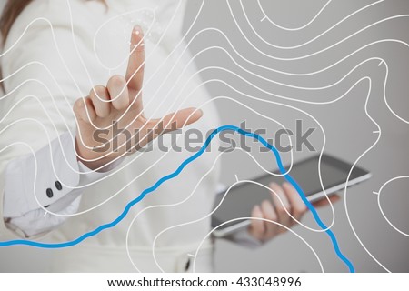 Geographic information systems concept, woman scientist working with futuristic GIS interface on a transparent screen. Royalty-Free Stock Photo #433048996