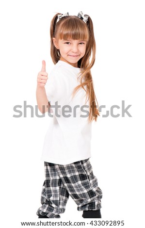 Happy little girl showing thumbs up gesture, isolated on white background