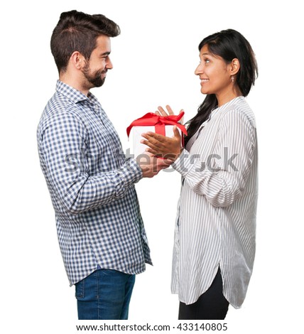 boyfriend giving a gift to his girlfriend
