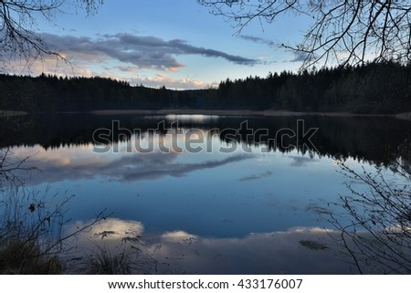 Evening panorama Picture of the old pond or lake from medieval age. Picture taken evening before storm in the summer in Czech republic region czech moravian highland. Perfect place for fishing.