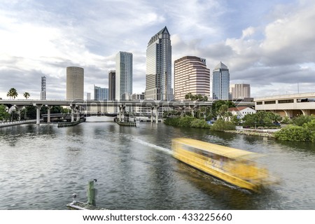 Downtown Tampa Bay, Florida with ferry passing by.