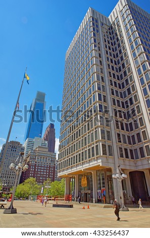 Municipal Services Building and skyscrapers in Philadelphia, Pennsylvania, the USA. It is central business district in Philadelphia. Tourists on the square.