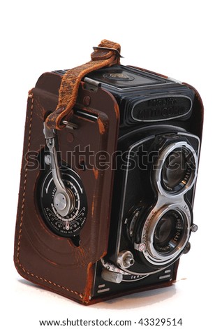 Closeup of an old medium format, twin lens camera isolated on white background