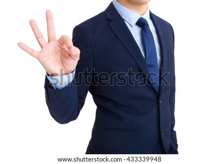 Business man showing ok sign gesture